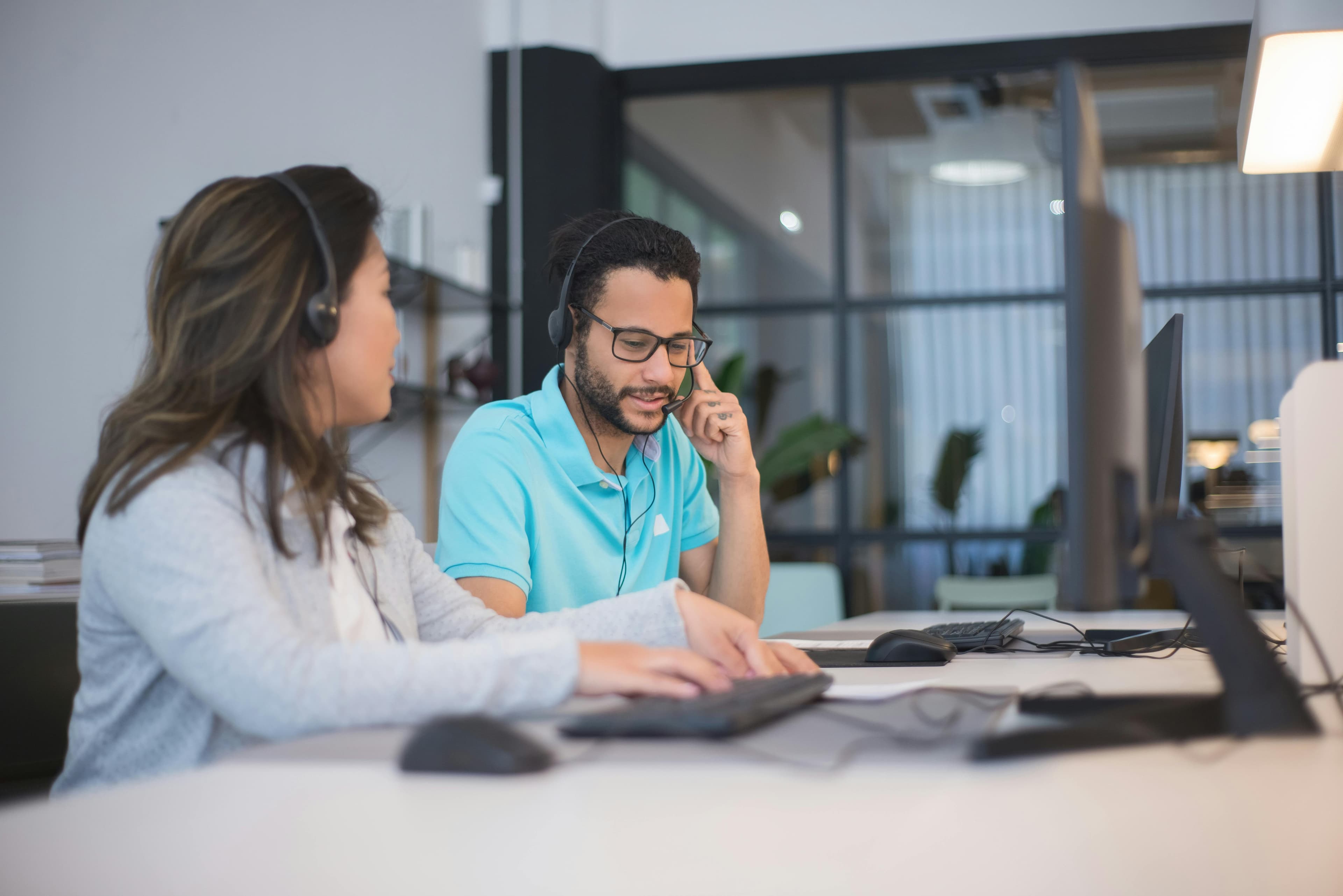 Man and woman working in an office