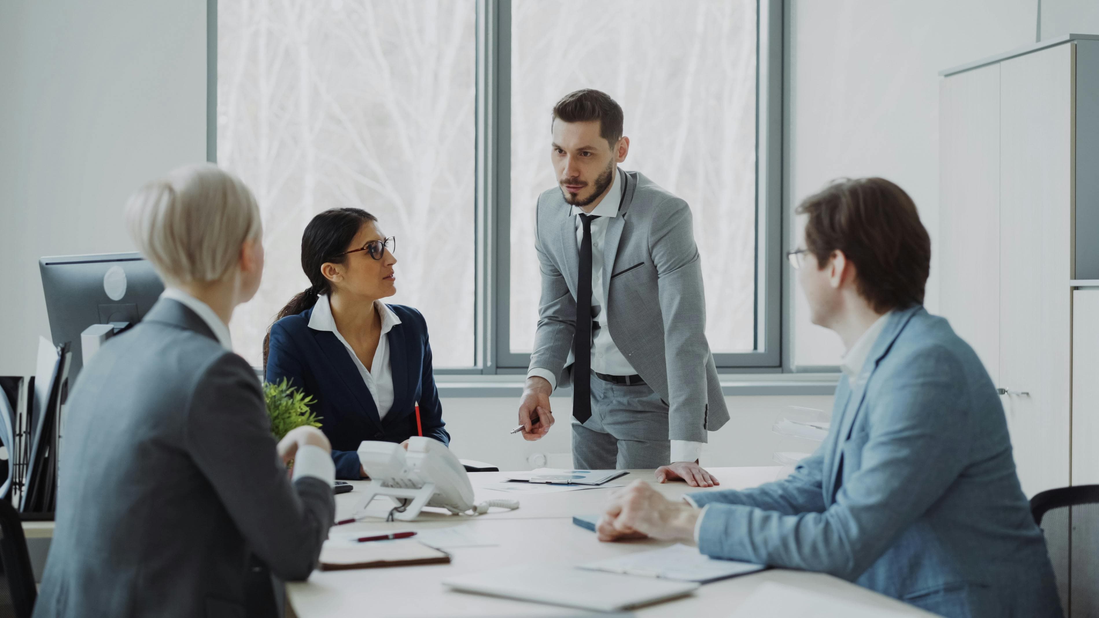 Business Meeting in Modern Office Setting